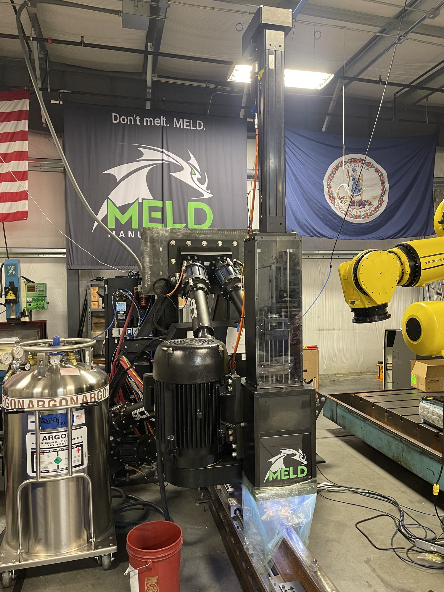 MELD additive-manufacturing head mounted on the Stewart platform